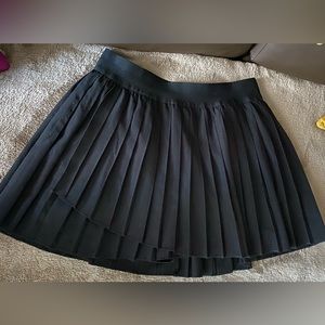 pleated black high waisted skirt